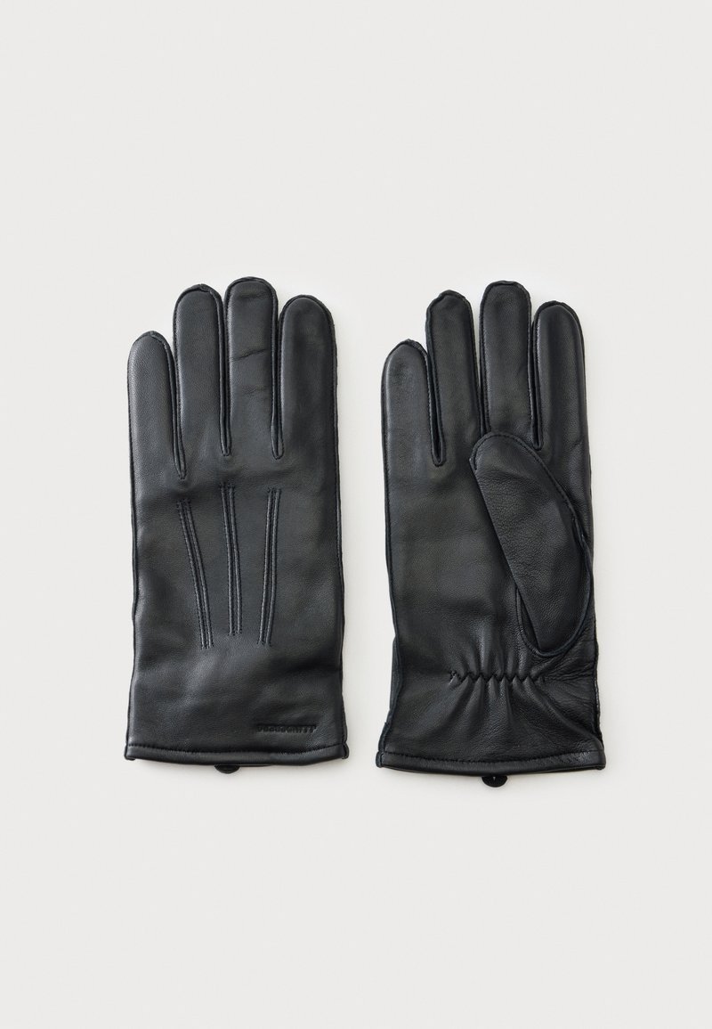 Paire de gants en cuir noir avec coutures décoratives, présentés à plat, une paume vers le haut et un dos vers le haut sur un fond blanc uni.