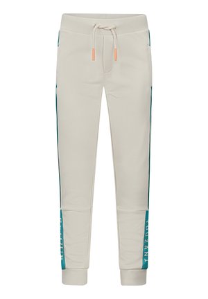 Beige joggingbroek met aqua blinde strepen en tekst. Gemaakt van zacht materiaal, heeft een elastische tailleband met een trekkoord en geribbelde manchetten.