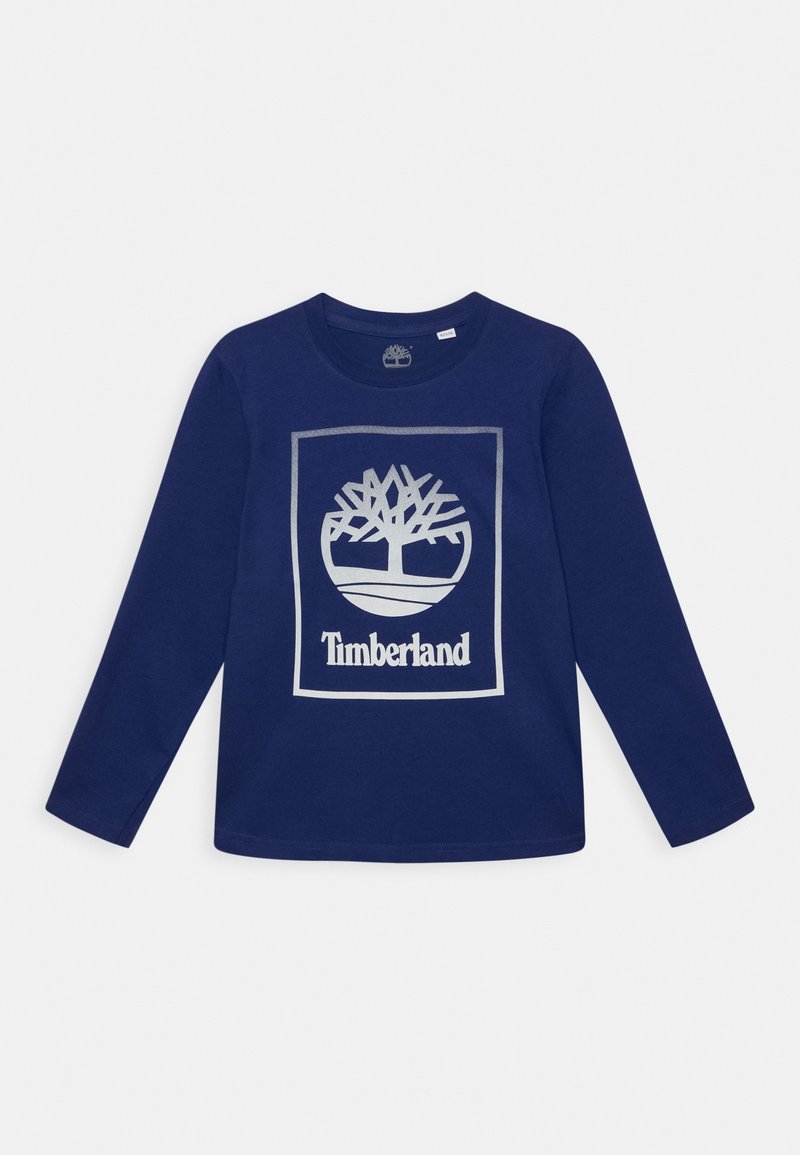 Námořnické tričko s dlouhým rukávem z bavlny, s bílým logem stromu a textem "Timberland" v obdélníkovém rámečku. Kulatý výstřih.
