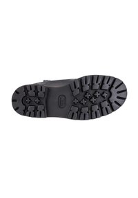 Suela de bota de goma negra que presenta patrones de banda de rodadura profundos, incluidos formas hexagonales y estelares para una mejor adherencia y tracción.