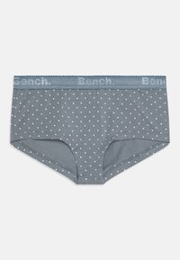 Sivé bavlnené hipsterské nohavičky s bielymi bodkami, s textúrovaným modrým pásom so značkou "Bench". Vlnité okraje pozdĺž pásu.