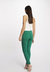 Morgan PETRA - Vaqueros slim fit - green