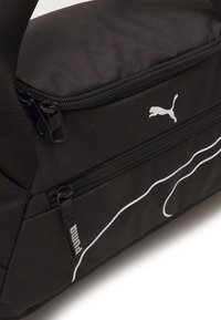 Puma FUNDAMENTALS BAG XS UNISEX - Αθλητική τσάντα - black