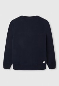 Felpa navy con collo a giro e polsini a coste. Presenta un piccolo logo bianco nella parte bassa della schiena sinistra. Materiale in cotone liscio.