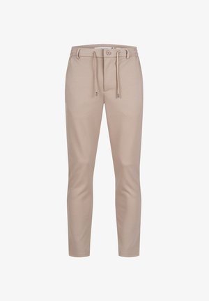 Beige slim-fit broek met knoop- en trekkoordsluiting, lussen voor een riem en taps toelopende pijpen.