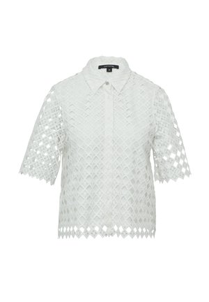 White short-sleeve shirt with a lace-like diamond pattern, button-front placket, and scalloped hem. Made of textured fabric.