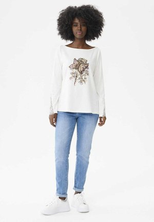 - Jeansy Slim Fit