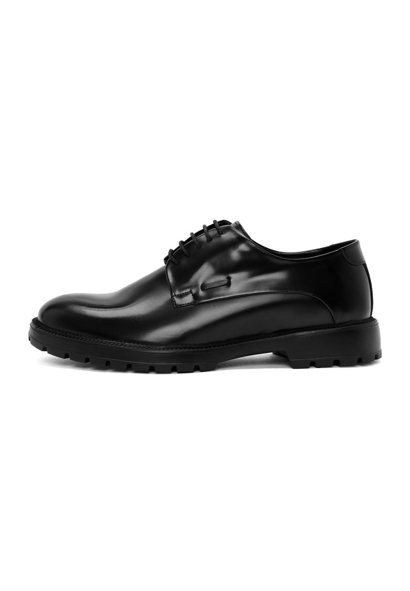 Scarpe eleganti in pelle nera con finitura liscia, design a lacci, punta rotonda e suola spessa in gomma con motivo per una presa sicura.