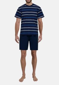 Navy short-sleeve t-shirt with horizontal blue and white stripes, paired with navy shorts, both made of lightweight fabric.