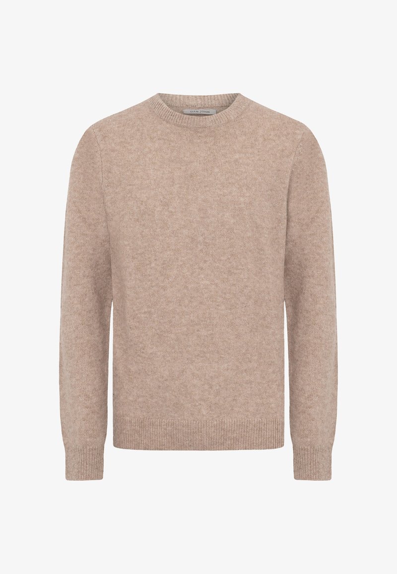 Beżowy sweter z okrągłym dekoltem wykonany z miękkiej dzianiny, cechujący się luźnym krojem, długimi rękawami oraz ściągaczami przy mankietach i na dole.