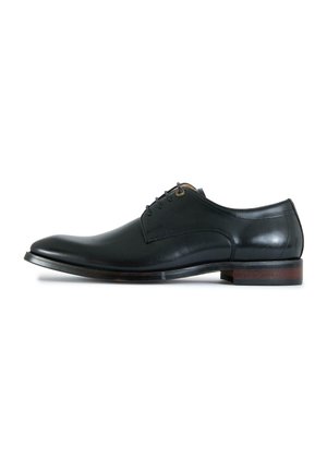 Black leather men's dress shoe with closed lacing, smooth finish, and brown stacked heel, shown in side profile.