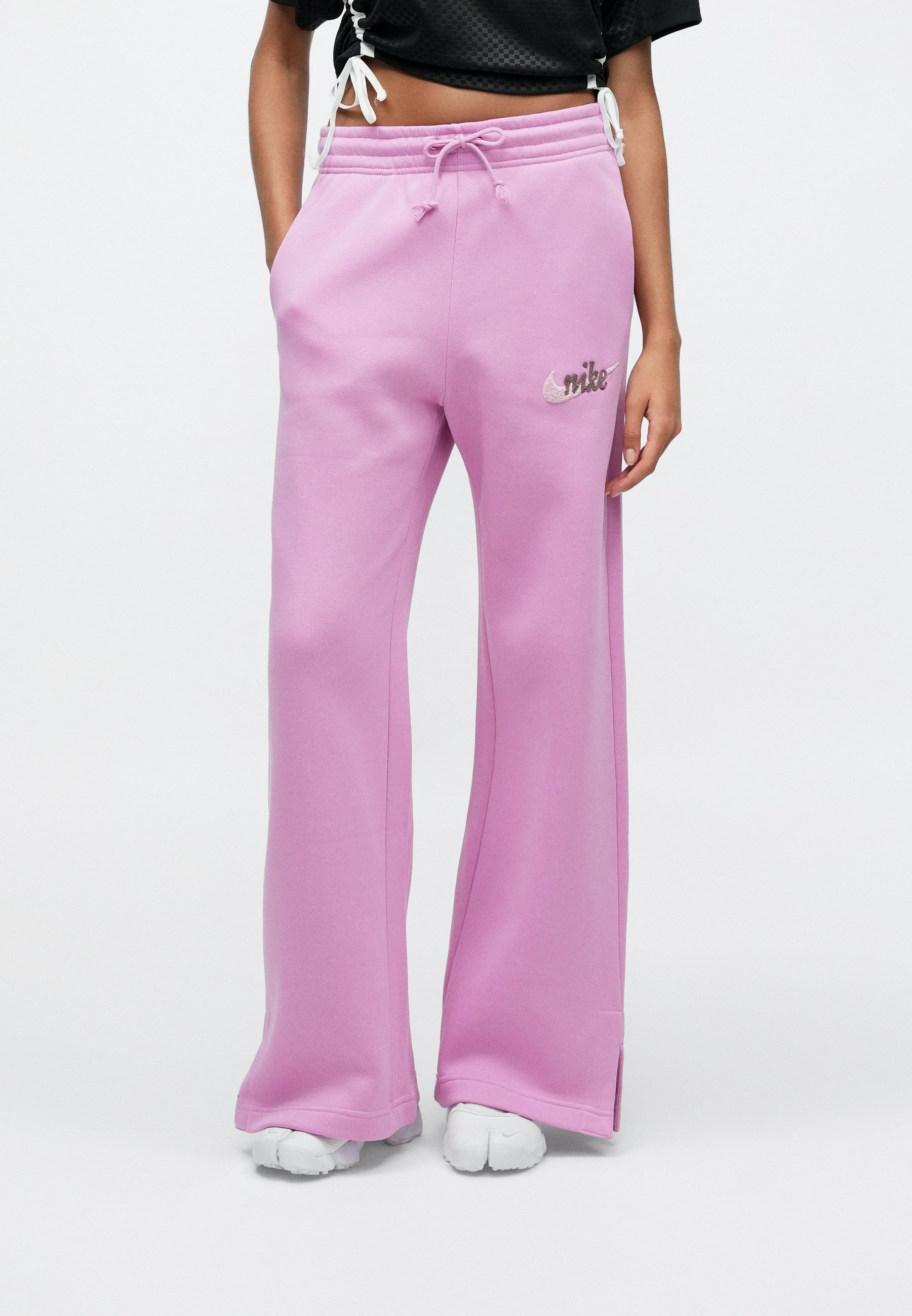 nike swoosh tracksuit pink