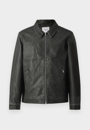 Black leather jacket with a smooth texture, snap collar, full front zipper, and two side pockets. Features minimal stitching details.