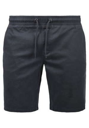 Shorts noirs en tissu léger, dotés d'une taille élastique, d'un cordon de serrage et d'une texture lisse et mate.