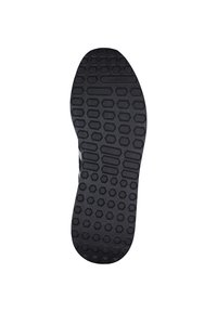Black rubber shoe sole with hexagonal tread pattern and Adidas branding near the toe. Designed for traction and durability.
