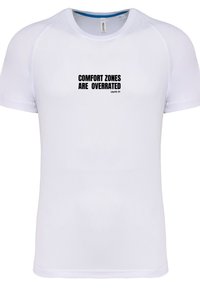 White short-sleeve t-shirt made of breathable fabric featuring a black printed text: "COMFORT ZONES ARE OVERRATED LEAVE IT!"