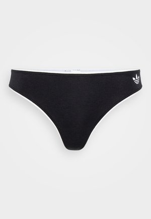 Melna bikini apakša ar baltām akcentiem, izgatavota no mīkstas auduma. Tam ir zema vidukļa dizains un neliels balts logo sānos.