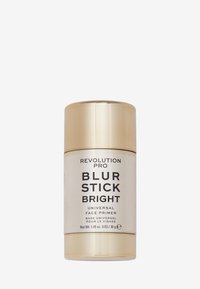 Revolution Pro Blur Stick Bright, universell ansiktsprimer i en gullfarget sylinderbeholder med svart tekst og en glatt, metallisk finish. 30g.