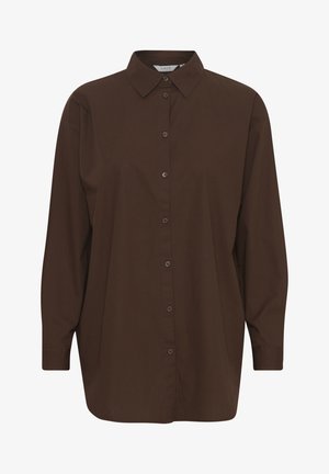 Hnedá košeľa na gombíky s klasickým golierom, dlhými rukávmi a voľným strihom. Vyrobená z hladkej bavlny s jednoduchou textúrou.