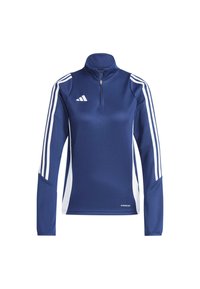 Jūras zila sporta džemperis ar ceturtdaļas rāvējslēdzēju, balti sānu paneļi un trīski baltas svītras uz katras piedurknes. Izgatavots no gludas, mitrumu atgrūdošas auduma.