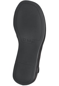 Semelle de chaussure en suède noir avec une surface en caoutchouc lisse, présentant un logo rectangulaire marqué "hög" et un numéro de taille gravé "4".