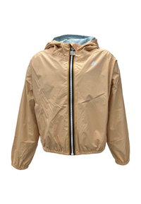 Giacca leggera beige a vento con cappuccio, polsini elasticizzati, cerniera frontale con dettagli colorati e foderatura azzurro chiaro a contrasto.