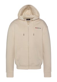 Sudadera con cremallera color beige, con un bolsillo frontal, cordones ajustables y un logo en el lado izquierdo del pecho. Tejido suave y puños de canalé.