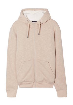 Felpa beige con zip e interno morbido e testurizzato. Presenta un cappuccio regolabile con lacci, due tasche frontali e polsini e orlo a coste.