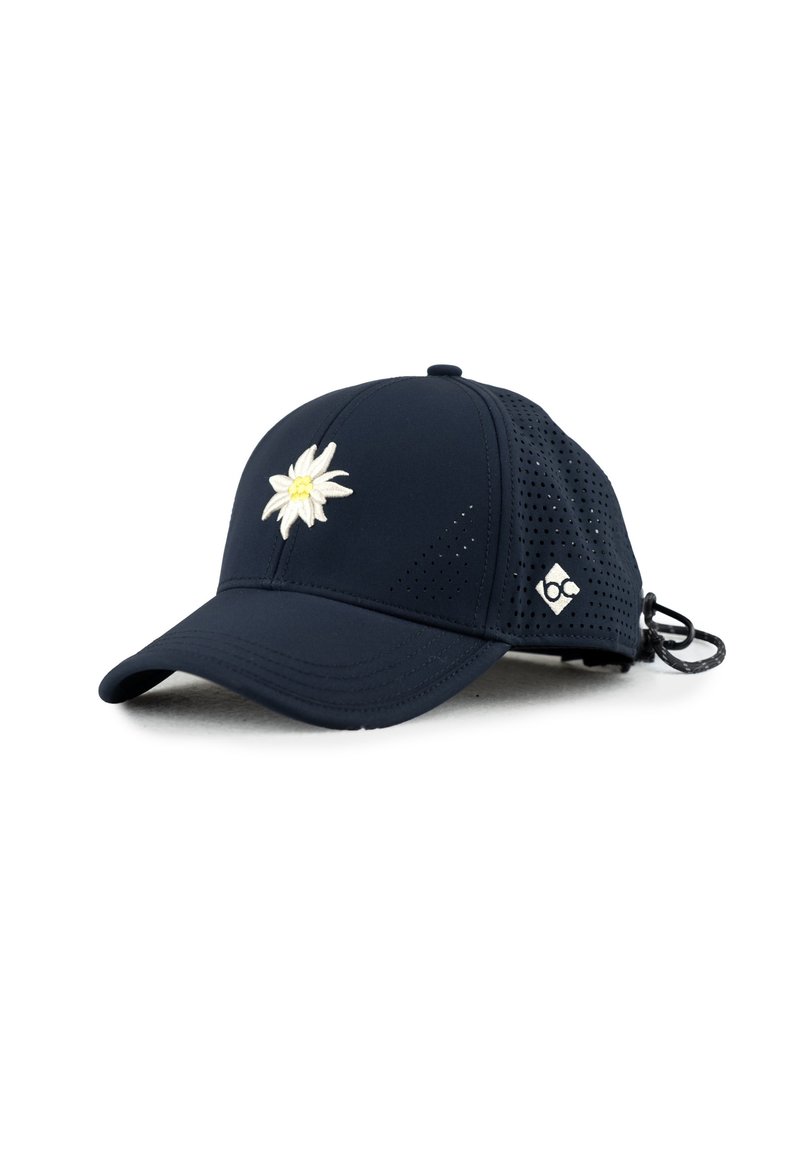 Navy blue cap with perforated sides, featuring a white embroidered daisy on the front and a logo on the side. Adjustable strap at the back.