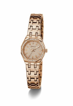 Orologio rosa oro con quadrante ottagonale, decorato con strass, un quadrante testurizzato e un design a bracciale a maglie. Marca: Guess.
