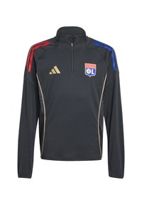 Veste de sport noire à manches longues avec zip quart, rayures rouges et bleues sur les épaules, accents dorés et logo doré brodé sur la poitrine.