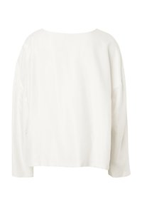 T-shirt blanc à manches longues avec col rond, épaules tombantes et ourlet droit, présenté sur un fond blanc uni.