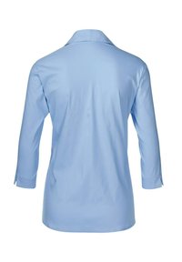Camicia azzurro chiaro a maniche lunghe con colletto a punta, realizzata in tessuto liscio, caratterizzata da una vestibilità dritta e polsini con aperture.