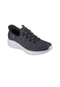 Zapatilla deportiva de punto negra con cordones elásticos, superficie texturizada y suela blanca moteada. Diseño ligero para mayor comodidad.