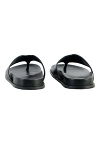 Sandali flip-flop neri con suola piatta e due cinturini curvi, dotati di un sostegno centrale per le dita. Realizzati in gomma con una texture liscia.
