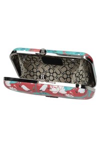 Kompakti metallikukkaro, jossa on kukkakuvio punaisena, turkoosina ja valkoisena. Sisäpuoli on kuvioitu vuoraus logolla. Klipsisuljenta.