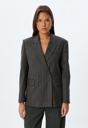 Double-breasted gray blazer with red pinstripes, notch lapels, front pockets, and tailored fit. Made of textured fabric.