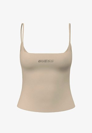 Top corto beige con spalline sottili e piccolo logo "GUESS" impreziosito da cristalli al centro del petto.