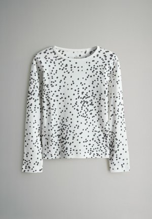 Lange mouwen T-shirt in witte katoen met zwart stippenpatroon. Ronde halslijn en zoom, casual pasvorm, geen zichtbare hardware of accenten.
