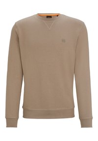 Felpa beige realizzata in morbido tessuto, con scollatura a girocollo, maniche lunghe e un piccolo logo ricamato sul petto. Dettaglio di cucitura a contrasto.