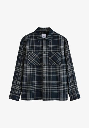 Tengerészkék és szürke kockás ing gombos elejével, két mellzsebbel, hegyes gallérral és hosszú ujjakkal. Textúrált anyagból készült.