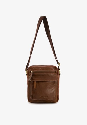 Brown leather crossbody bag with a smooth texture, zippered front pocket, and adjustable fabric strap. Brand name "VENEZIA" embossed.