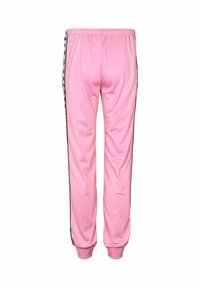 Ružové teplákové nohavice s elastickým pásom a manžetami, so vzorovanými čierno-bielymi bočnými pruhmi, zobrazené zozadu.