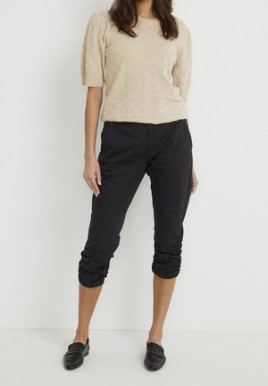 Spodnie materiałowe