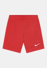 Red mesh athletic shorts featuring a flat waistband, side ventilation holes, and a white Nike swoosh logo on the lower right.