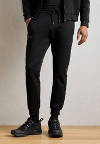 Antony Morato TROUSERS METAL EFFECT RUBBER LOGO - Pantalon de survêtement - black