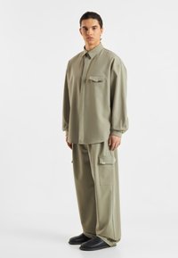 Don't Waste Culture - TULON UNISEX - Button-down blouse - light green Thumbnail Image 1