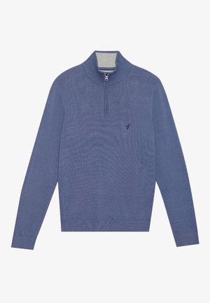 Suéter azul de punto con un alto cuello y media cremallera. Presenta puños y dobladillo acanalados, con un pequeño logotipo en el pecho. Textura suave.