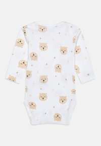 Bodysuit de mangas longas branco com um padrão repetido de rostos de urso em castanho claro, apresentando estrelas e uma textura de algodão suave e lisa.