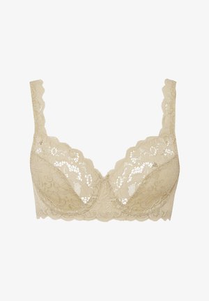 Soutien-gorge in pizzo beige con bordi scallop, motivo floreale, coppe semi-trasparenti e spalline regolabili. Senza ferretto, offre un supporto morbido.